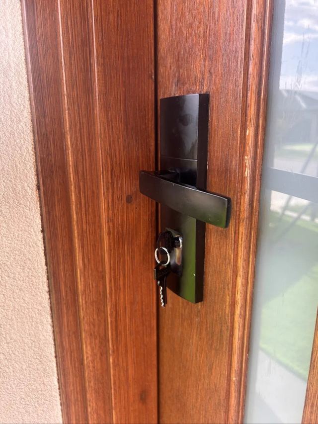 Entrance set replaced on a solid timber front door